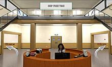 Why does Mrs. Cooper, the milf teacher, want John to visit her at home instead of talking at college?