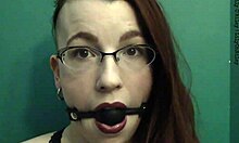 dark lipstick ballgag drooling with intense eye contact