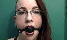 dark lipstick ballgag drooling with intense eye contact
