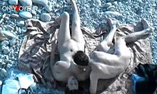 Whoa, hot babe with big natural tits gives head on a public beach! 🌊