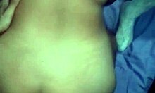 Friends kiss and get put on all fours in a group setting.