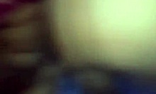 Friends kiss and get put on all fours in a group setting.