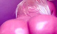 look at this blonde twerking her oiled huge tits and buttocks!
