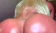 look at this blonde twerking her oiled huge tits and buttocks!
