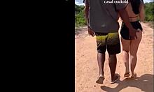 what's hiding on the dusty dirt road with curvy brunette?