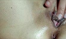 He massages my pussy with oil till I cum close-up!