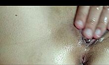 He massages my pussy with oil till I cum close-up!