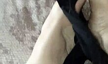 gretala rubs thong on her feet