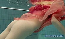 Katya Okuneva stuns in red dress, teasing by the pool with underwater allure