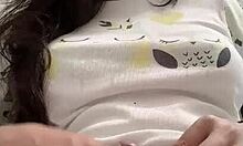 Shemale Puts Hair Clamp on Cock During Solo Play