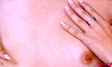 Enchanting Brunette Beauty Shows Sexy Body on Sofa