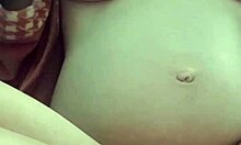 Pregnant Woman Explores Solo Pleasure in Intimate Session