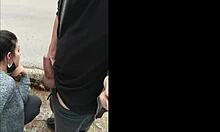 Holy cow! Watch this hot brunette suck dick outdoor in public!