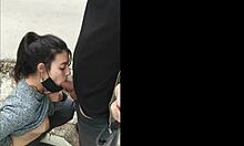 Holy cow! Watch this hot brunette suck dick outdoor in public!