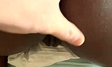 In the bedroom, ebony amateur bends over for blonde's doggystyle fucking.