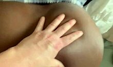 In the bedroom, ebony amateur bends over for blonde's doggystyle fucking.