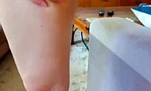 Mature woman gives a close-up view of her legs and intimate area.