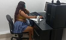 18 years old student in uniform shows off big natural tits while studying computer classes