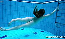 Wow, this sexy girl flaunts her stunning young body underwater in pool!