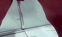 Young teen bends over in bathroom, squirting while exposing juicy ass and asshole.