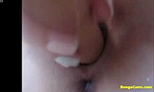 Busty teen fingers her shaved pussy and squirts