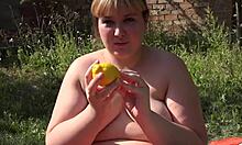 bbw pushes lemon out of hairy pussy
