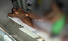 wife teases masseuse with pussy jumping from bikini