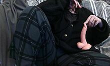 Exploring bisexual play with a strapon in a quiet session