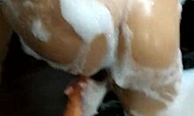 In the motel bathtub, I masturbate and orgasm on the giant dildo.