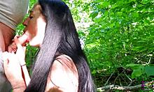 Young black-haired girl sucks fat cock to cum in forest