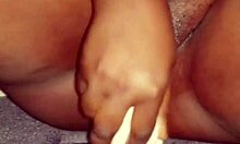 This ebony babe rips her clothes and plays with her wet pussy solo.