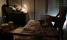 Japanese beauty in stockings finishes with a wild standing handjob.