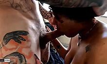 Tattooed Brazilian babe in lingerie shows natural tits.