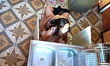 Unfaithful wife sneaks away to bang the plumber in kitchen.