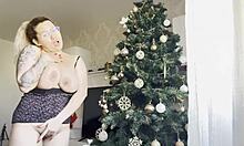 big tits BLONDE MASTURBATES near CHRISTMAS tree