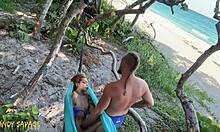 pretty girlfriend fingering wet pussy at beach with friend watching