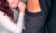 cute redhead gives sloppy public blowjob on balcony. her plump lips work magic outdoors.