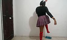 My friend's wife dancing in a miniskirt.