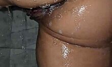 A mature latina milf relaxes in the shower bathing session