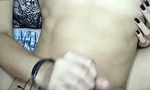 Debora Prado sat behind me, stroking my big cock with black nails and lube