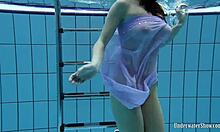 Petite Teen Aneta Displays Big Tits In Purple Dress While Bathing In Pool