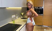 Smoking Blonde Milf Teases with Her Big Assets.