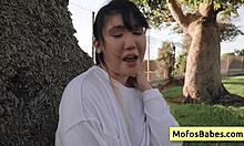 sexy asian teen 18+ shows off big natural boobs outdoors to friend.