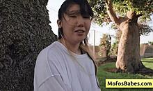 sexy asian teen 18+ shows off big natural boobs outdoors to friend.