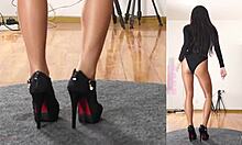 asian girl in pantyhose and leotard practices her dance routine