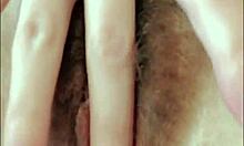 russian young student in stockings talks while fingering her wet hairy pussy close-up