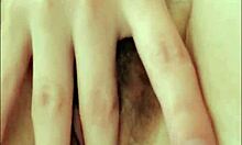 russian young student in stockings talks while fingering her wet hairy pussy close-up