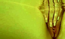 Babe masturbates in bathtub with close-up views