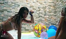 just messing around with my friend in the jacuzzi, teasing her wet pussy.