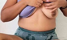 Pretty student excites her natural big tits at home